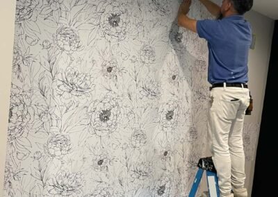 highly skill worker installing wallpaper
